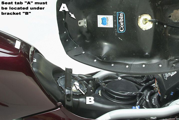 Seat Tab 'A' shown that must be located under bracket 'B'