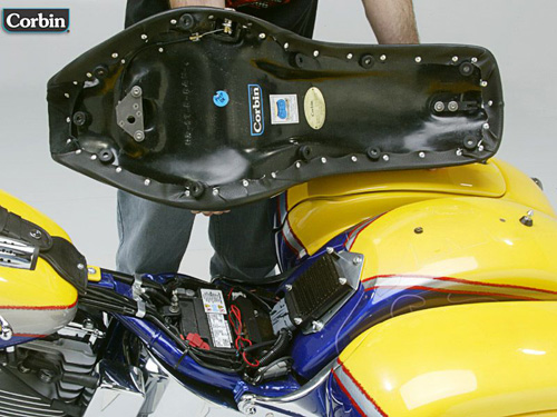 a person is holding Gambler seat showing rear side with Key lock system pre-installed